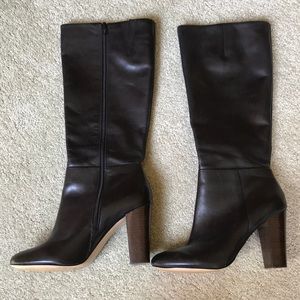 Lord and Taylor black leather knee high boots.